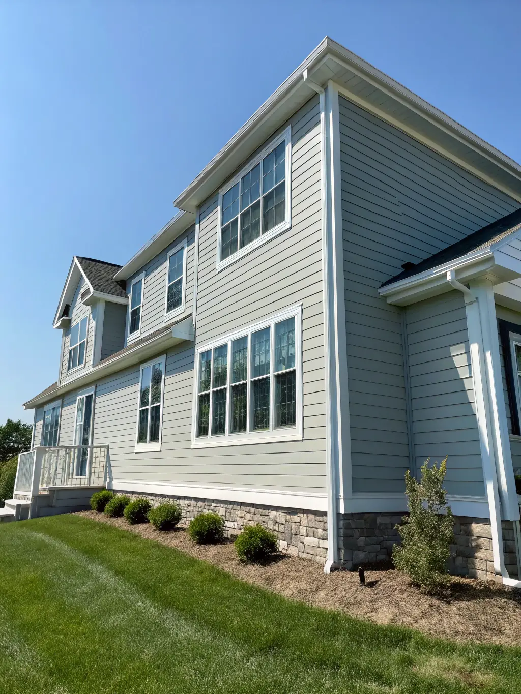 A visually appealing image of a home with newly installed siding by JDI Contracting, highlighting the quality and craftsmanship of the siding work.